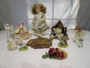 lot 166 image: STEWART ROSS PORCELAIN DOLL, SANTA ON THE BEACH FIGURINE, COUNTRY GATHERINGS ANGEL, PORCELAIN KITTEN,ELEPHANT FIGURINE, UNIQUE CLOCK W A VARIETY OF SEEDS SEALED IN IT, APPEARS VINTAGE, PORCELAIN ANGEL, LAMB, PLUSH BUNNIES