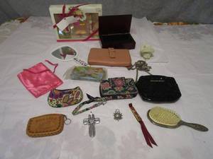 lot 312 image: ANTIQUE HEAVY VICTORIAN BRUSH, POSSIBLY STERLING SILVER BUT NOT VERIFIED, VINTAGE CLUTCHES &amp WALLETS FROM VERA BRADLEY, VICTORIA SECRET, STACY ADAMS BOW TIE, PONY EXPRESS RIDER PIPE TAI WINDS COLOGNE BOTTLE