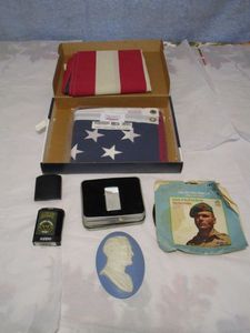 lot 454 image: 3X5 US FLAG, ARMY ZIPPO, CHROME ZIPPO, BALLADS OF THE GREEN BERET RECORD