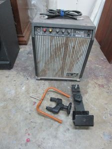 lot 482 image: GUITARS WALL MOUNTED HOLDERS, ROSS BASS AMP, TURNS ON