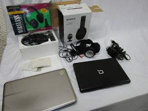 lot 536 image: ELECTRONICS LOT... WIRELESS HEADPHONES, SONY WIRELESS HEADPHONES WITH STAND, HP LAPTOP, COMPAQ LAPTOP, POWER CORDS.. SEE PICS FOR DETAILS.