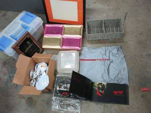lot 555 image: DVD LIMITED COLLECTORS EDITION OF 300, PRADA DUSTER BAG, VINTAGE BUTTON PINS, STORAGE CONTAINER, PICYURE FRAME WITH MAT, WICKER BASKET, ARTIST ORGANIZER CARRYING CASE,