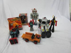 lot 477 image: VINTAGE FISHER PRICE ROBOTS, MARS ROBOTS, SWITCH &amp GO DINOS