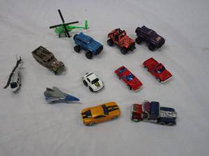 lot 589 image: VINTAGE LOT OF TRANSFORMERS AND OTHER VEHICLES