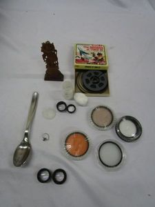 lot 581 image: CAMERA LENSES, GREEK STYLE WODDEN CARVED STATUE, VINTAGE SUPER 8 THE BRIDGES AT TOKO-RI FILM REEL, VINTAGE LOOKING RING, SPOON SHOWS S 1810