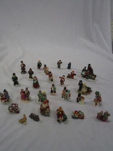 lot 573 image: GENEROUS LOT OF MINI CHRISTMAS VILLAGE SCENE PEOPLE AND ANIMALS.&nbsp