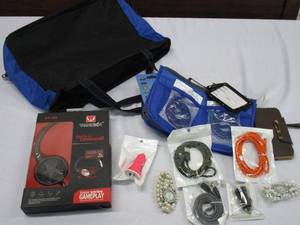 lot 616 image: VARIOUS USB AND CHARGING CORDS NEW IN PACKAGE, MISC MINI WALLETS NEW WITH TAGS, GAMING HEADSET, TOTE BAG