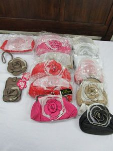 lot 660 image: NEW CLUTCHES AND WALLETS WITH ROSE ON FRONT