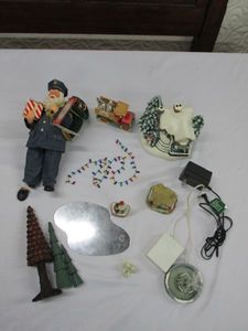 lot 624 image: CHRISTMAS LOT... DEPARTMENT 56 HOLIDAY TREES, MIRRORED POND, DEPT 56 FIGURES, DEPT 56 LIGHTED FOUNTAIN, DEPT 56 STRING OF LIGHTS, 1984 HALLMARK S.CLAUSE TREE DELIVERY TRUCK, DEPARTMENT 56 COLLECTIBLE SANTA IN POLICE UNIFORM