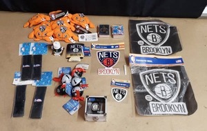 lot 39 image: Large Lot of NBA Brooklyn Nets Items (26 Total Items) - Stickers, Christmas Ornaments, Plushes, Basketball Cards, Head Bands, and More