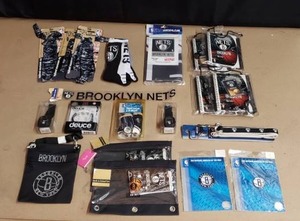 lot 41 image: Large Lot of NBA Brooklyn Nets Items (20 Total Items) - Watches, Flag, Patches, Socks, Head Bands, Pencil Bags, and More