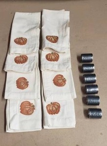 lot 247 image: Lot of 8 Pumpkin Napkins with 6 Metal Napkin Rings