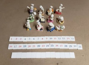lot 260 image: Pillsbury Doughboy Danbury Mint Calendar Figurine Set with Number Tiles
