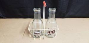 lot 281 image: 2 Vintage Glass Milk Bottles with Wire Carrier