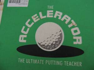 lot 164 image: The Accelerator putting teacher