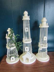 lot 212 image: 3 white light houses- 22, 20 and 15