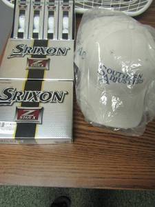 lot 230 image: NIB SRIXON  golf balls x 3 boxes (containing 4 packs)  and 7 baseball caps