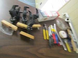 lot 250 image: Assorted tools- Tuff tools screw driver set, pliers, toilet fill valve, 2 towel racks, saw blade, scissors, wrench