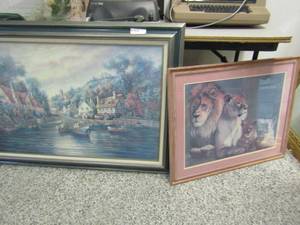 lot 302 image: Framed Boat dock with cottages 43x31 and Lion family framed 30x24