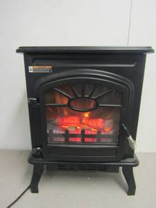 lot 310 image: Electric heater 22.5 tall