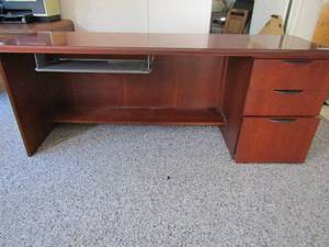lot 329 image: Heavy solid wood desk Cherry stain Pull out keyboard desk 3 drawers 72 long 28x22