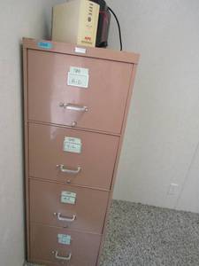 lot 337 image: 4 drawer metal file cabinet plus 2 surge protector boxes 53x25x28