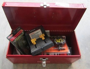 lot 388 image: Red craftsman toolbox with door lock, install kit, router guide, brushing kit, bolt hinge, templates, nails, metal paint kit and craftsman drill bits
