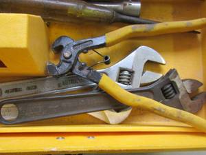 lot 199 image: Yellow toolbox with hammer wrenches flathead screwdrivers