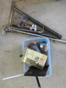 lot 188 image: L shaped ruler, Dwalt battery charger #DW9116, Dremel versa tip NIP etc.