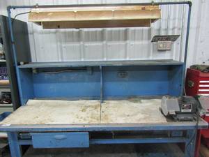 lot 13 image: Large wood and metal workshop table 4 outlet plugs overhead light 75 tall 72 wide 31 deep has drawer  und under shelf PLUS craftsman 1.25 HP bench grinder model 257 191200 bolted onto top