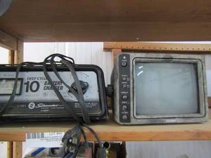 lot 45 image: Schumacher 612 volt deep cycle battery charger plus voyager portable TV