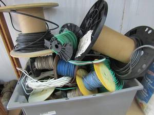 lot 54 image: Several Spools of wire in tub