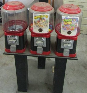 lot 2 image: Beaver brand gumball machine 3 candy machine plus sticker machine 56 tall x 24 x18