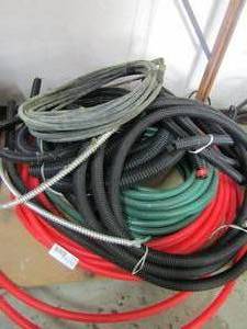 lot 88 image: Assorted garden hoses different sizes
