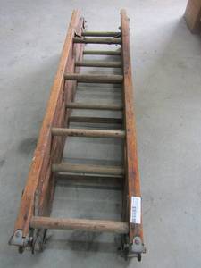 lot 104 image: Stapleton ladder co. wooden ladder 13 wide 52tall extends to 13
