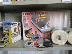 lot 121 image: Store and feed system, George Foreman tabletop grill in box, George Forman grill cover and 2 rolls of paper towels