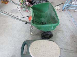 lot 110 image: Scotts edge guard seed spreader plus rolling storage step stool