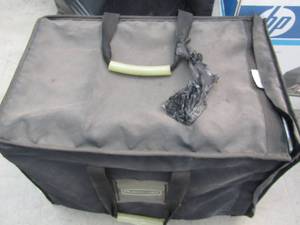 lot 186 image: Rubbermaid travel container with metal lining 16T 22 w and 14 deep