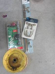 lot 146 image: Traditions metal drape hold back set and matching rods, toilet tank repair kit yellow metal spool