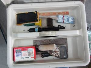 lot 147 image: Cooler with paint brushes, spackle tools, paint mixer, level, etc. 22W 15tall