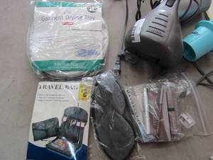 lot 150 image: Misc. sewing items, ironing board, blow dryer, drying rack, massager, travel bag