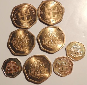 lot 98 image: Royal Caribbeans Labadee Medallions 5 large 2 small