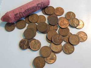 lot 139 image: Wheat Pennies unsearched Qty. 39 & Wheat Penny  1909 -1917 S Unsearched ROLL