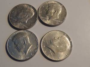 lot 167 image: Kennedy half dollars 1964 x 4 with luster