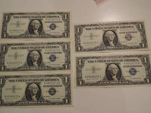 lot 34 image: 1957 SILVER CERTIFICATE ONE DOLLAR BILLS -  SERIES 1957A CONSECTIVE NUMBERS 71-75     CRISP  UNC   (X $$)