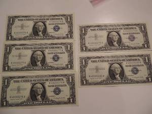 lot 42 image: 1957 SILVER CERTIFICATE ONE DOLLAR BILLS -  SERIES 1957A CONSECTIVE NUMBERS 76-80    CRISP  UNC   (X $$)