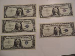 lot 74 image: 1957 SILVER CERTIFICATE ONE DOLLAR BILLS -  SERIES 1957A CONSECTIVE NUMBERS 96-99 CRISP  UNC    and #730 (X $$)