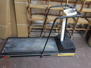 lot 8 image: PRECOR TREADMILL, UNTESTED.
