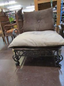 lot 44 image: ANTIQUE OUTDOOR IRON LOW SITTING CHAIR.&nbsp