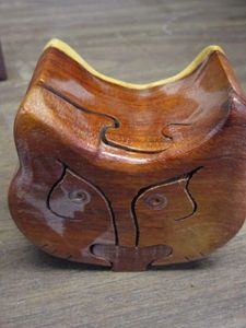 lot 84 image: WOODEN TIGER TRINKET PUZZLE